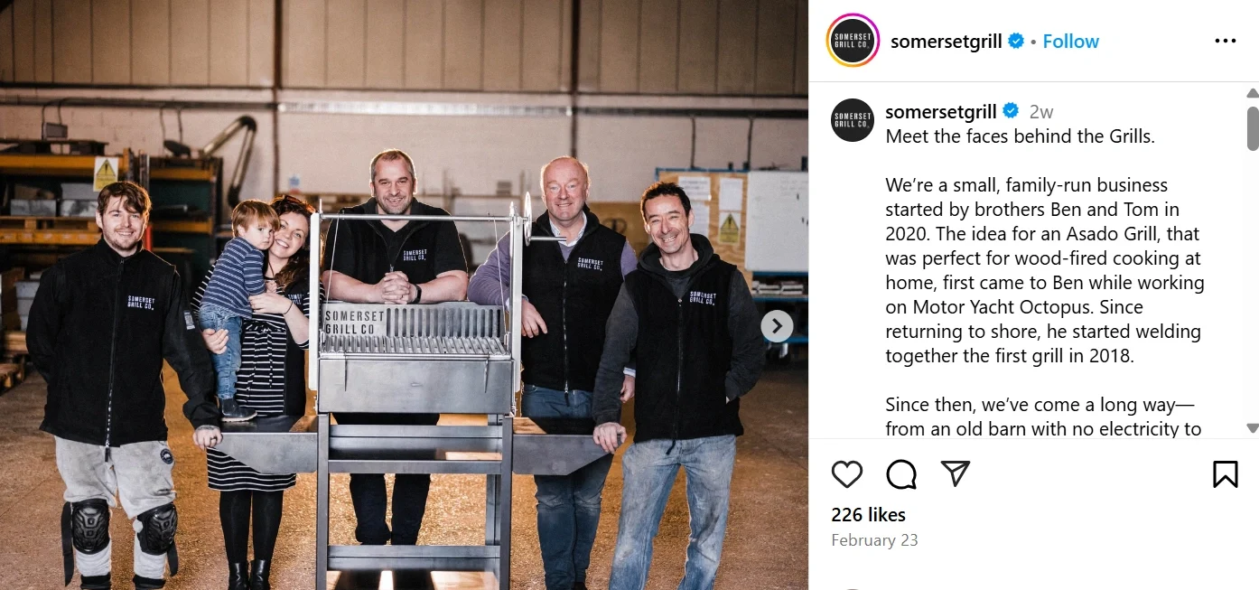 Somerset Grill Instagram Post – Meet the Makers Behind the Grills Somerset Grill's Instagram post featuring the team behind their handcrafted wood-fired grills. The photo showcases the family-run business founders and their commitment to quality, craftsmanship, and innovation in grill making.